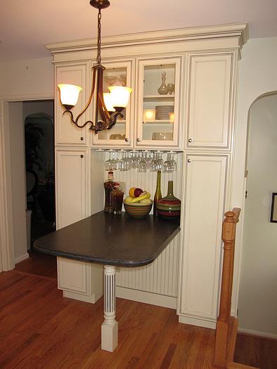 Seating and storage in remodeled kitchen in College Hill, Cincinnati, Ohio
